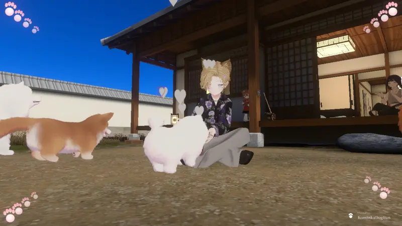 A visitor petting a white dog by the veranda